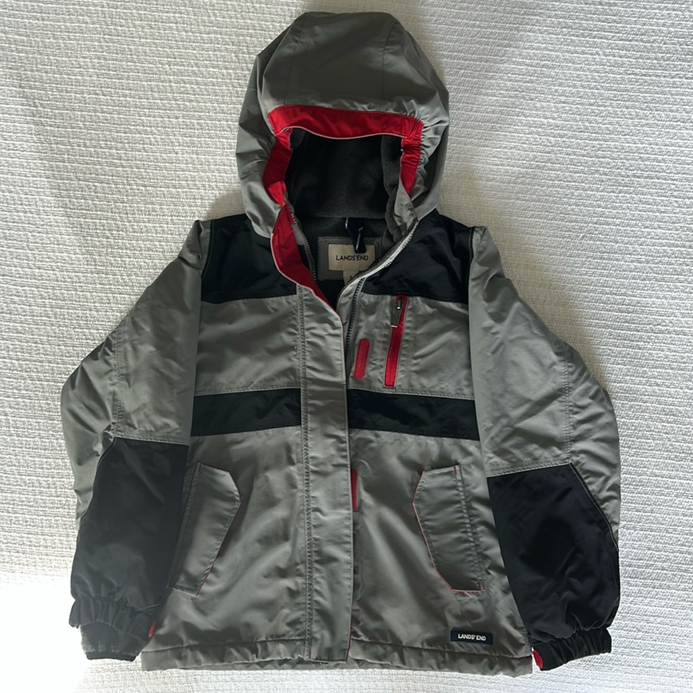 Lands End winter jacket (Squall) boys small size 8. Gray with black and red trim